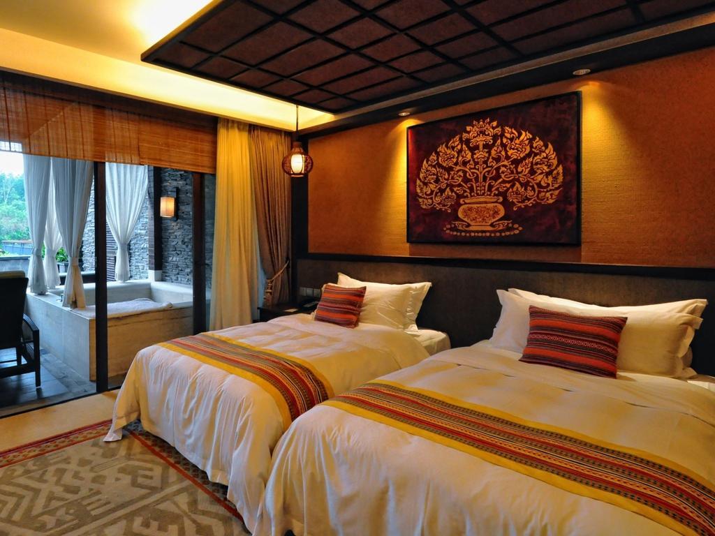 The Tang Hotel Hainan Mount Qixian Baoting Room photo